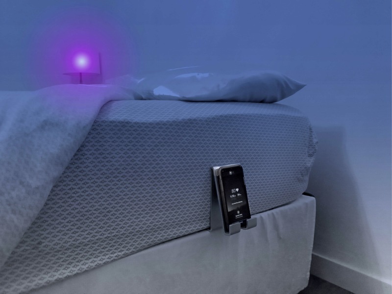 The SleepSpace Smart Bed changing the light in a room to purple automatically at the wind down time.